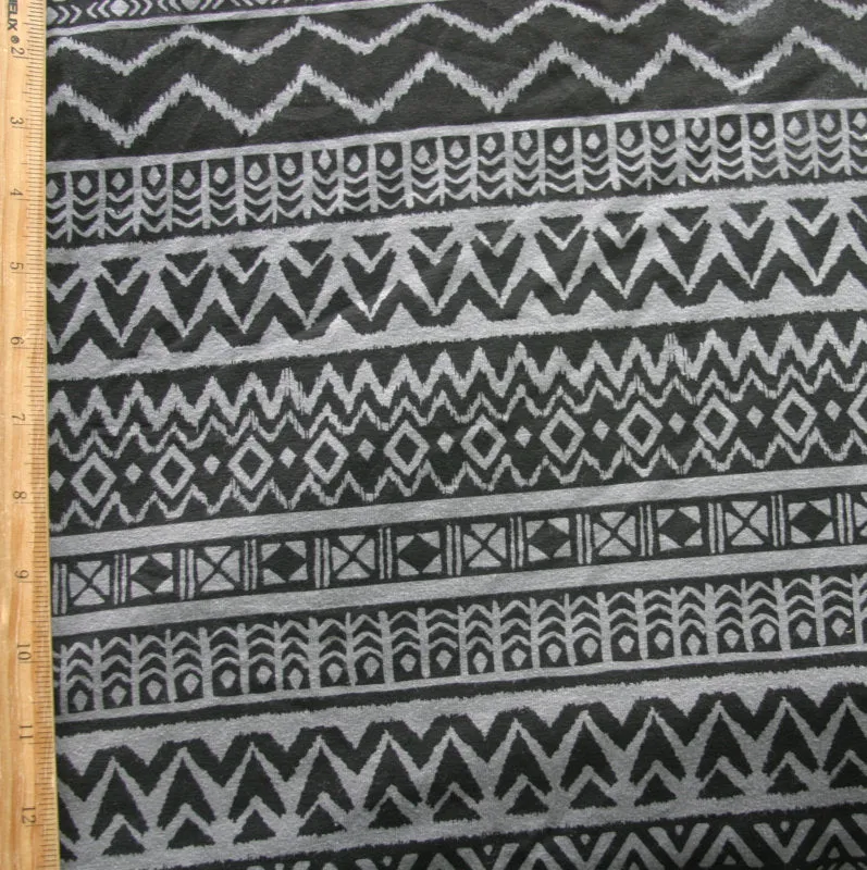 Black Tribal Print on Dark Grey Cotton Lycra Knit Fabric