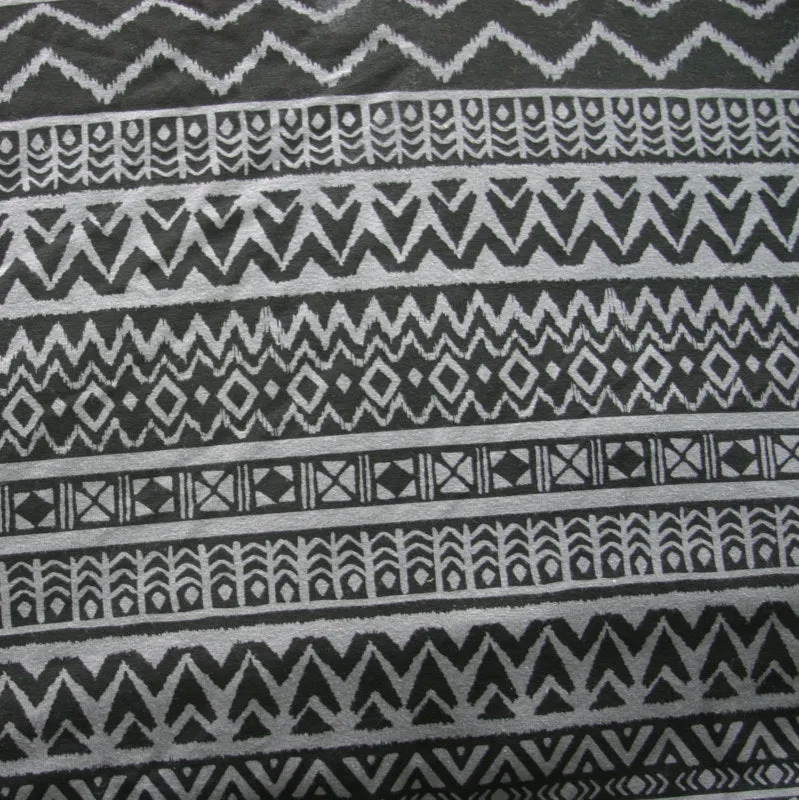 Black Tribal Print on Dark Grey Cotton Lycra Knit Fabric